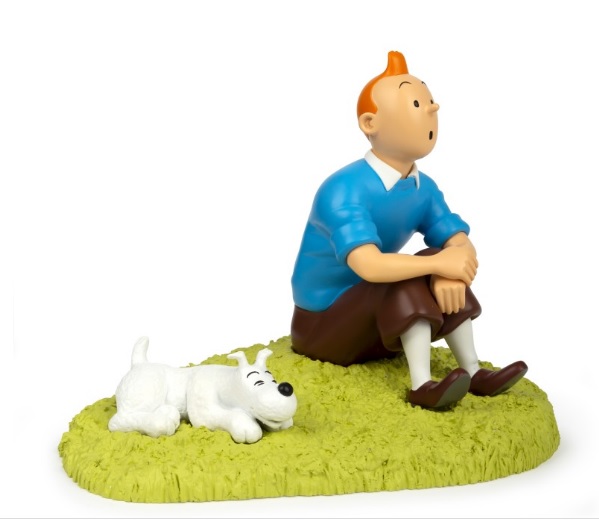 TINTIN ASSIS DANS L'HERBE